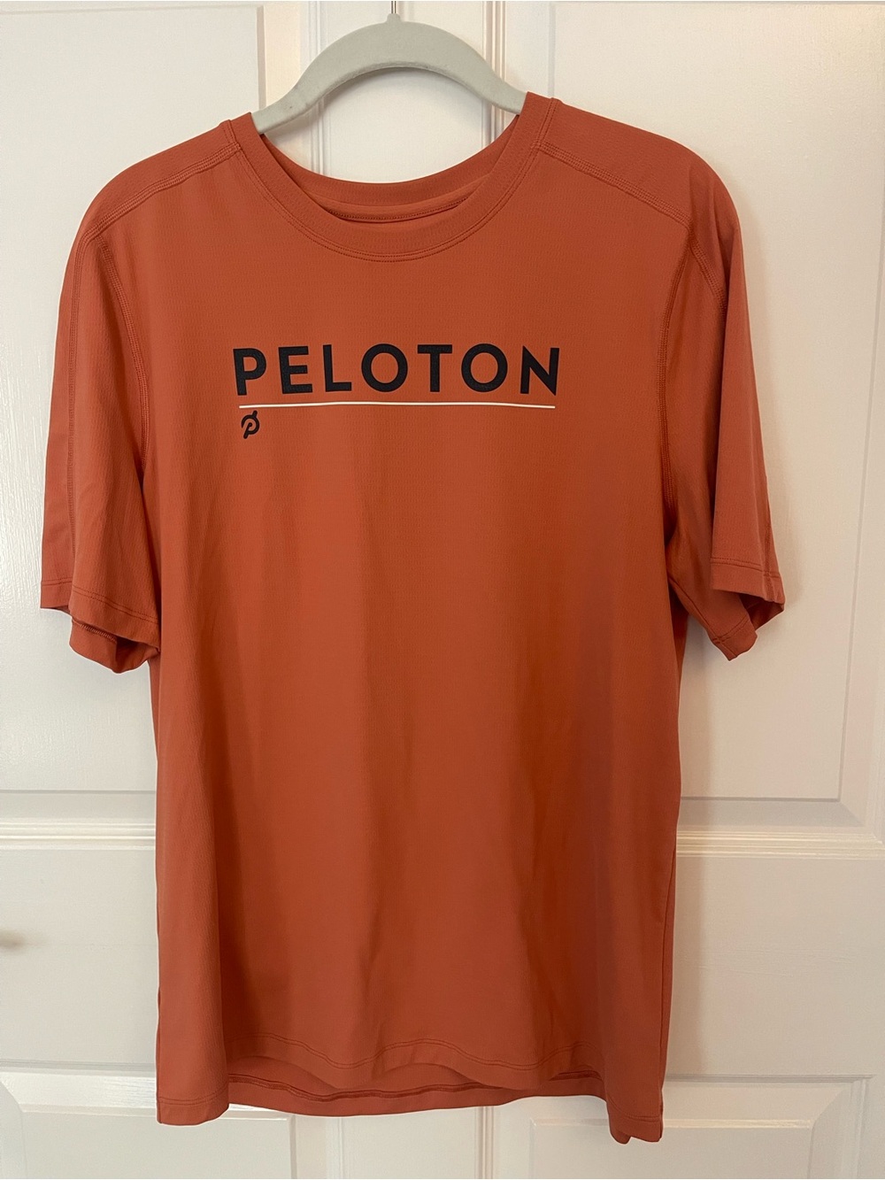 Peloton Men’s Short Sleeve Tee - Rust Orange with Black Logo
